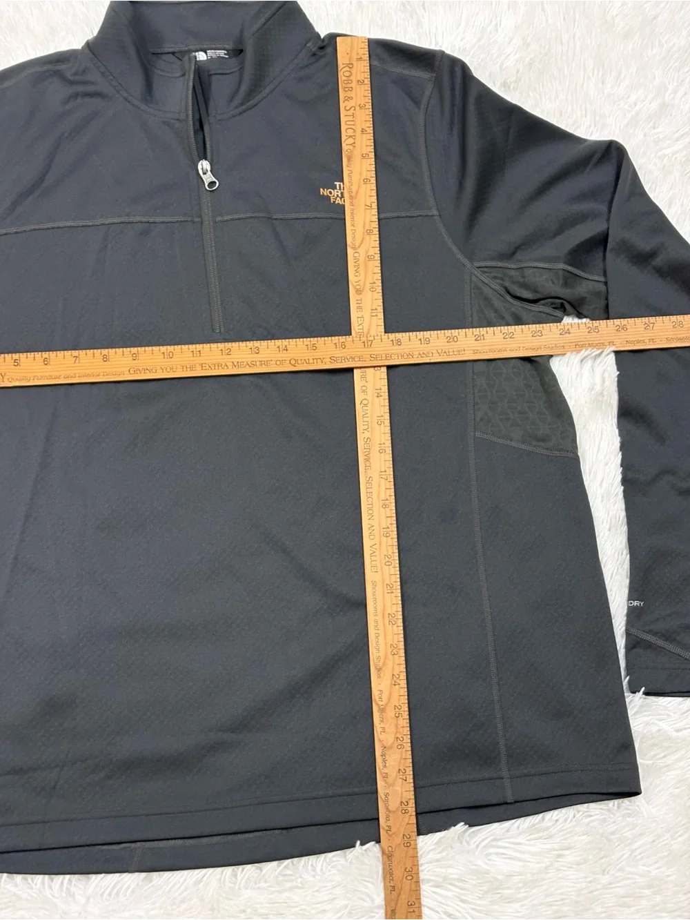The North Face Black Half-Zip Performance Top with Gold Logo